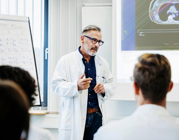 Doctor teaching a class