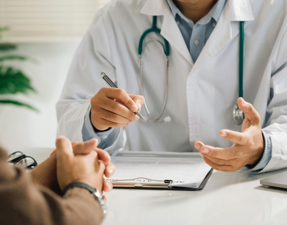 physician reviewing lab results with patient